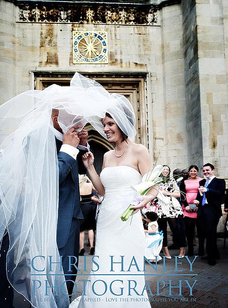 Trinity College Cambridge wedding by Chris Hanley Photography 20 don't look now but I think he's chewing it - I love Steph's smile in this shot though