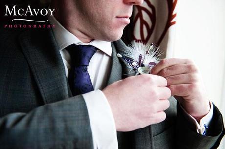 Beeston Manor wedding by McAvoy Photography 121 Chris fixes his buttonhole