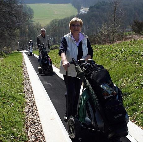 Travelator Transporting Golfers