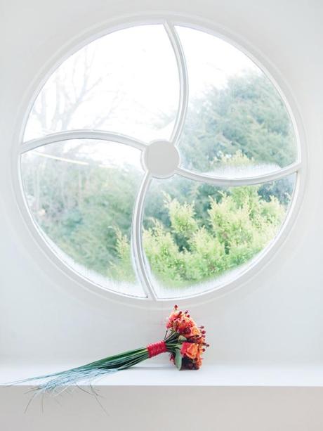 I love this shot of the bouquet by the window
