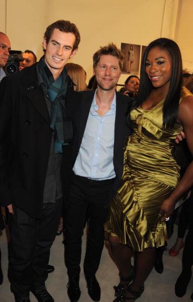 LONDON, ENGLAND - SEPTEMBER 21: Andy Murray, Christopher Bailey and Serena Williams attend the Burberry Prorsum Spring/Summer 2011 fashion show during LFW at Chelsea College of Art and Design on September 21, 2010 in London, England. (Photo by Dave M. Benett/Getty Images for Burberry)
