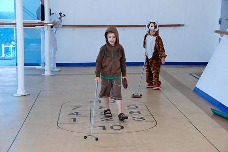 Our Australia and New Zealand Cruise Adventure Shuffleboard the first day at sea, Ollie is the tiger.