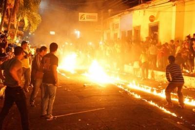 Attending The Crazy Fireball Festival (Bolas de Fuego) in Nejapa, El Salvador Fire on the streets of Nejapa **