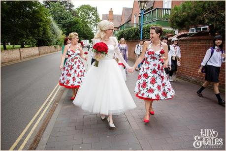 Bride preparation photography RSC Swan Theatre Wedding Photographer laughing with bridesmaids walking