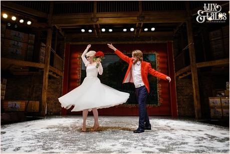 RSC Swan Theatre Wedding Photographer Royal Shakespeare Company twirling on the stage in the snow
