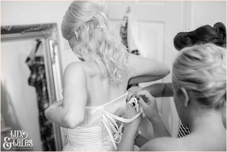 Bride preparation photography RSC Swan Theatre Wedding Photographer get into dress