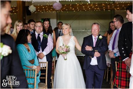 East Riddlesden Hall Wedding Photography pink English garden theme bride walks up aisle