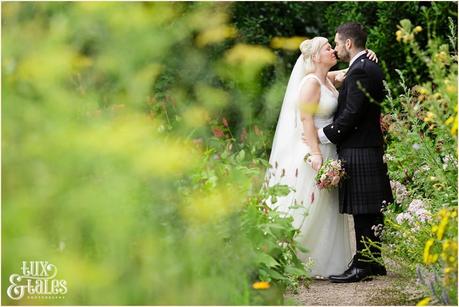 East Riddlesden Hall Wedding Photography pink English garden theme| walking in the garden