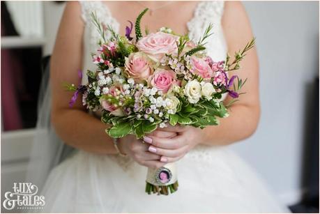 Bride Preparation photography East Riddlesden Hall wedding photographer flowers with locket