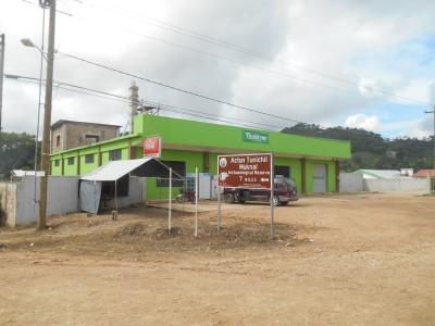 Backpacking in Belize: Cave Tour of Actun Tunichil Muknal The entrance by the green supermarket in Teakettle.