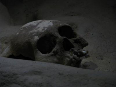 Backpacking in Belize: Cave Tour of Actun Tunichil Muknal A Mayan Skull in the caves - photo courtesy of Ray from The World According to Weech.