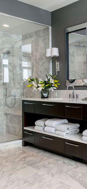 Sleek Bathrooms bathroom design. flooring tiles, stone. marble. wallpaper, shower. bathtub. ceiling. lighting. glass. decorative mirror. sanitary fittings and fixtures.