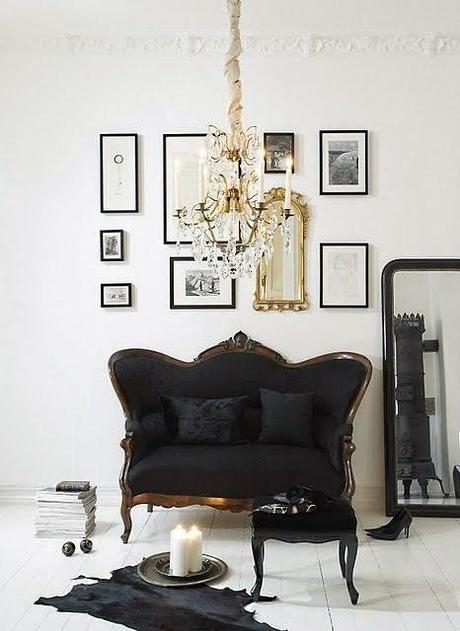 white walls black settee gold art wall gallery hide rug white walls black settee gold art wall gallery hide rug