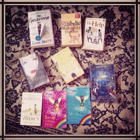 Chronicling the Busiest Weekend Ever Our Library Loot - the one missing is Piglet's Spot, which he is holding onto tightly and sleeping :)