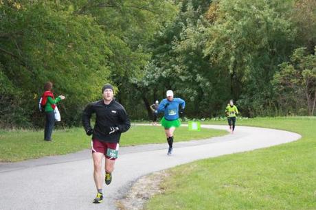 The final stretch of the 5K w/ Eric (in a tutu) hot on my heels! (photo credit: Tim Fencl)