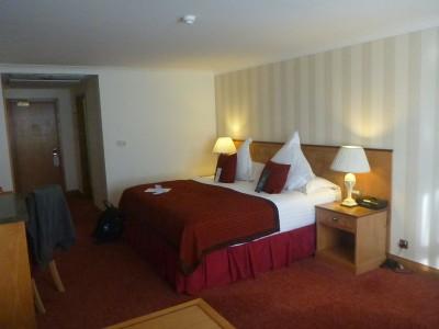 Staying in the World Famous Europa Hotel in Belfast, Northern Ireland Just comfy - by bed in the Europa Hotel.