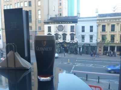 Staying in the World Famous Europa Hotel in Belfast, Northern Ireland A fresh Guinness with a view onto Great Victoria Street