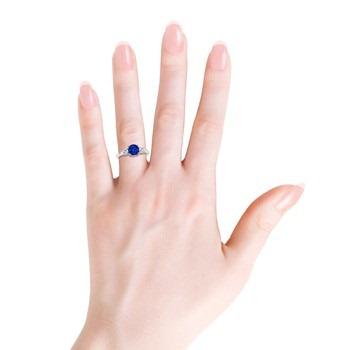 round-sapphire-and-diamond-three-stone-ring-hand-view round sapphire and diamond three stone ring hand view thumb | blog.angara.com