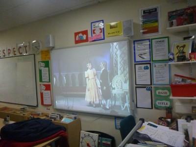 30 Year Reunion: School Tour of Kilmaine Primary School, Bangor, Northern Ireland Watching a Kilmaine play from the 1980s on the projector.