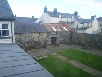 Backpacking in Northern Ireland: Staying in the Bushmills Hostel, North Coast Outdoor Courtyard to relax in.