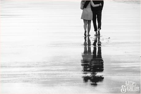 Whitby Love Shoot | Cass & Josh Photography Engagement Shoot in Whitby | Girl wearing Red Flower crown | Alterntive Couple whereing Vintage clothing | Couple holding each other as they walk