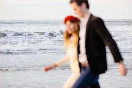 Whitby Love Shoot | Cass & Josh Photography Engagement Shoot in Whitby | Girl wearing Red Flower crown | Alterntive Couple whereing Vintage clothing | Water in focus