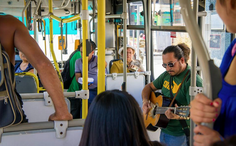 5 Reasons why Santiago is the Most Underrated South American City For Tourism A man relieving some of the morning transit stress with his guitar