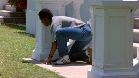 Axel Foley Such an athletic stance would look goofy with a pair of opera pumps. Fine shoe choice, Eddie.