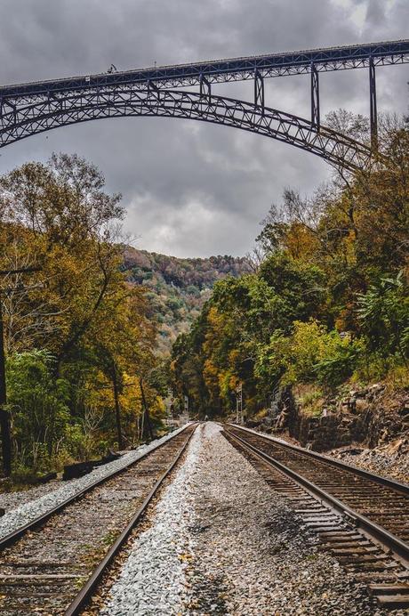 Experiencing the Bridge Day Festival at the New River Gorge in West Virginia New River Bridge Over Train Tracks
