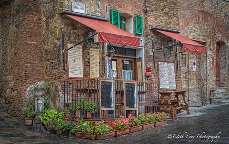 Montepulciano, Tuscany, Italy, restaurent, brick building, flowers, travel photography