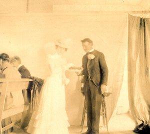 Belle Darling posing with her father on her wedding day, 1900.