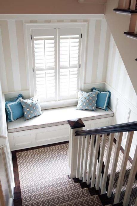 Adding a Bench Seat Add a window seat to the landing of your staircase. | 33 Insanely Clever Upgrades To Make To Your Home