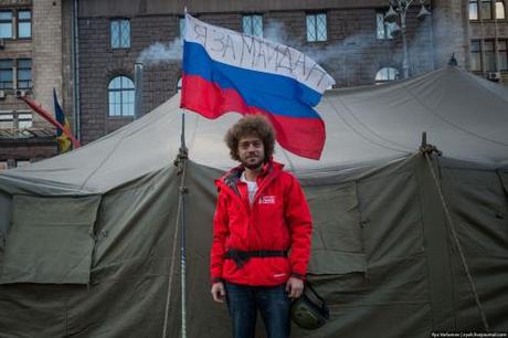 Media tent on Maidan. Photographer Ilya Varlamov planted a Russian flag inscribed 