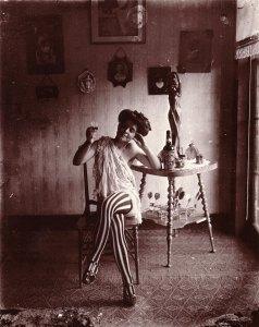 Storyville prostitute drinking Raleigh Rye, photographed by E. J. Bellocq circa 1912