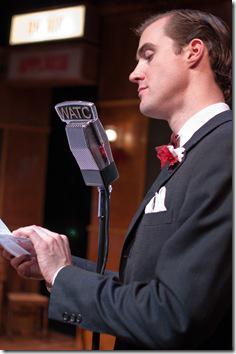 Chris Amos as the announcer in American Theater Company's Review: It’s A Wonderful Life: The Radio Play (American Theater Company)