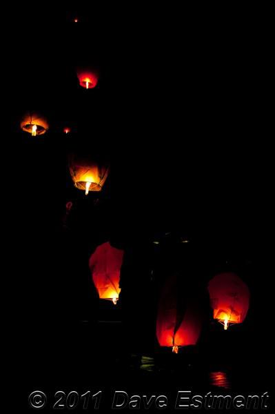 Sky lanterns sailing upwards