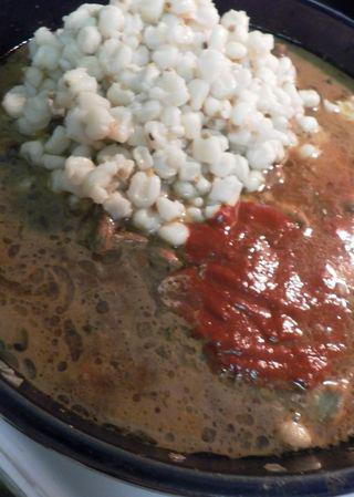 Pozole - Add corn & chile paste