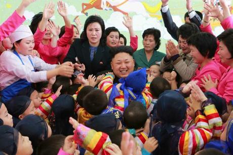 Kim Jong Un greets children residing at Pyongyang Orphanage and Baby Home after posing for commemorative photos with the children and staff on January 1, 2015 (Photo: Rodong Sinmun).