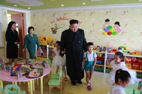 Kim Jong Un walks through a classroom at Pyongyang Baby Home and Orphanage on January 1, 2015 (Photo: Rodong Sinmun).