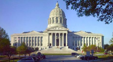 The Missouri State Capitol is noted for its architectural features, including its eight 48-foot columns on the south portico. It is five stories high, 437 feet long, 300 feet wide in the center and 200 feet wide in the wings. The dome is 238 feet high and the height of the wings is 88 feet. The building includes 500,000 square feet of floor space. Photograph