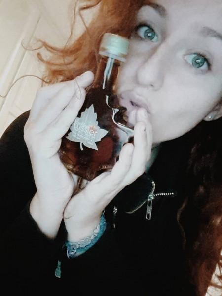 Me and the Maple Syrup I bought in Québec. My precious!