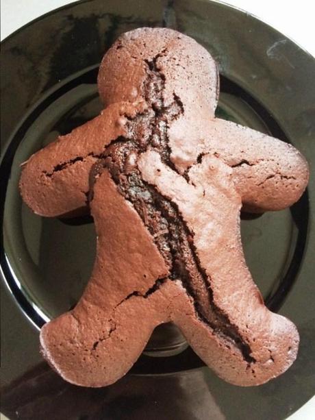 fudgy gluten free chocolate silicon moulded cake in the shape of a gingerbread man person