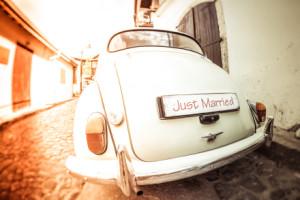 Antique wedding car with just married sign