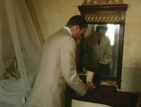 Meeting Sidney Reilly – A Cream Suit in Baku Reilly hides his incriminating documents in his hotel room's copy of the Quran.