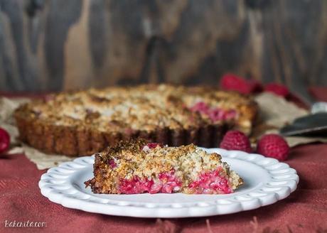 Raspberry Coconut Crumble Tart (Paleo, GF + Vegan) This Raspberry Coconut Crumble Tart has an almond coconut crust that doubles as a crumble topping, filled with fresh raspberries! This easy recipe is Paleo-friendly, gluten free, refined sugar free, and vegan.