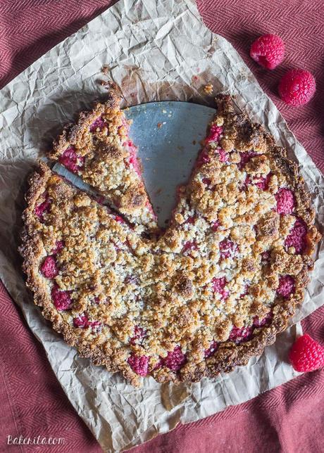 Raspberry Coconut Crumble Tart (Paleo, GF + Vegan) This Raspberry Coconut Crumble Tart has an almond coconut crust that doubles as a crumble topping, filled with fresh raspberries! This easy recipe is Paleo-friendly, gluten free, refined sugar free, and vegan.