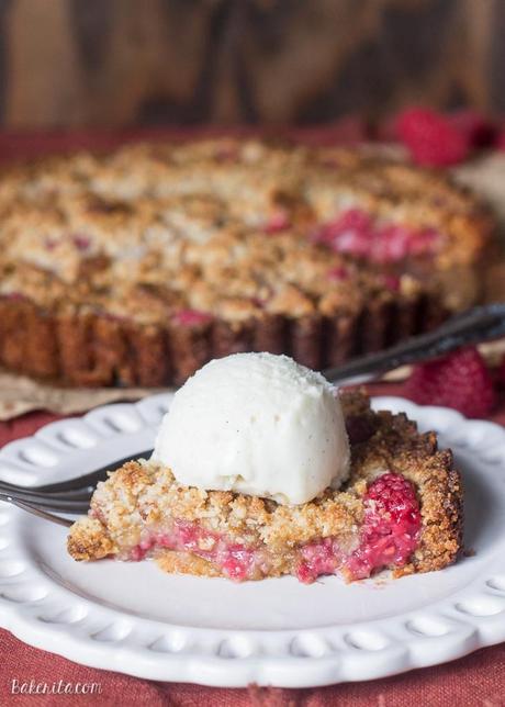 Raspberry Coconut Crumble Tart (Paleo, GF + Vegan) This Raspberry Coconut Crumble Tart has an almond coconut crust that doubles as a crumble topping, filled with fresh raspberries! This easy recipe is Paleo-friendly, gluten free, refined sugar free, and vegan.