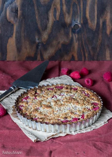Raspberry Coconut Crumble Tart (Paleo, GF + Vegan) This Raspberry Coconut Crumble Tart has an almond coconut crust that doubles as a crumble topping, filled with fresh raspberries! This easy recipe is Paleo-friendly, gluten free, refined sugar free, and vegan.