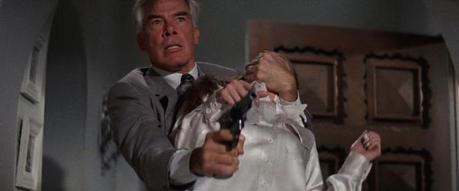 Lee Marvin’s Gray Flannel Suit in Point Blank Walker and his gun show Lynne who's boss.
