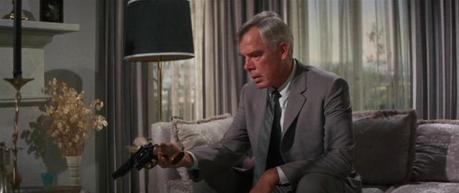 Lee Marvin’s Gray Flannel Suit in Point Blank Like any good houseguest, Walker puts down his .44 Magnum after he's finished using it.
